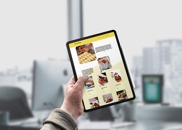 iPad Pro-In-Hand-Mockup.jpg