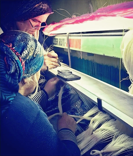 Image depicting towel production process at DAD Textile Company's facility, showcasing quality control.