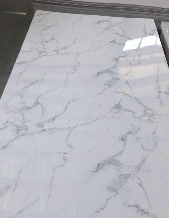 Statuario Marble finish panel featuring elegant white marble texture with natural veining for wall and ceiling applications.