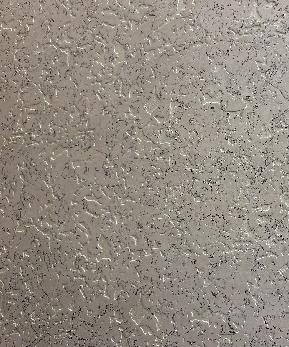Silver pebble-texture lamination sheet with scattered metallic highlights