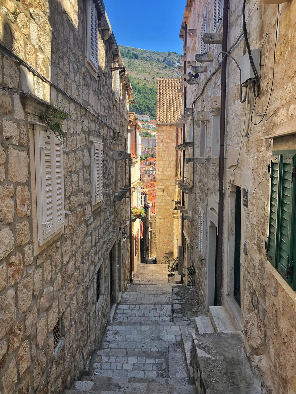 Narrow passage on a cobblestone alley, Korcula island.