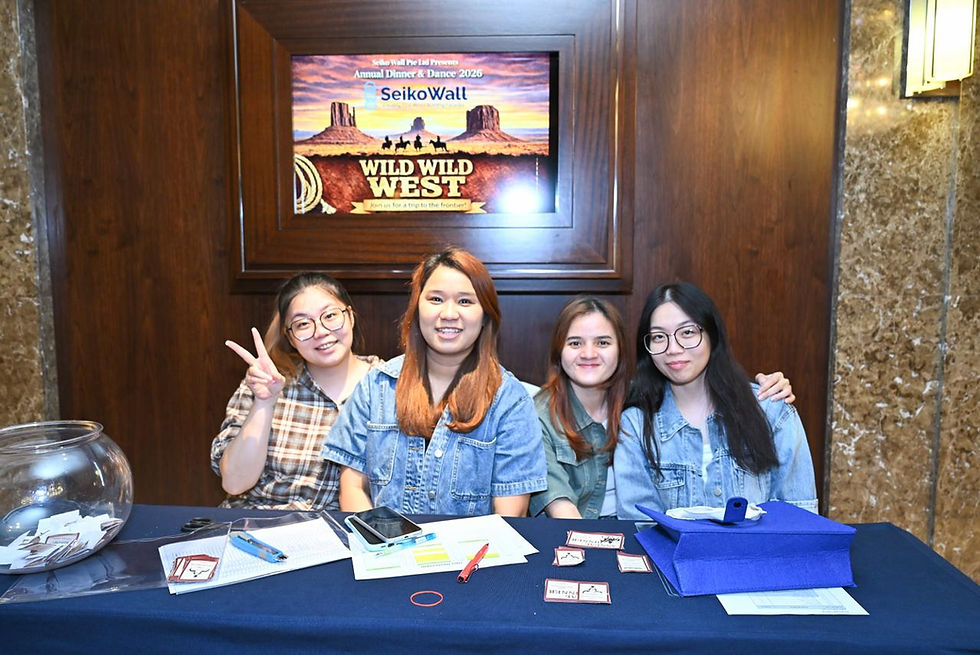 Emcee Singapore - The smiling members of the organizing committee welcomed attendees to the Annual Dinner, ready for a night of fun and excitement.