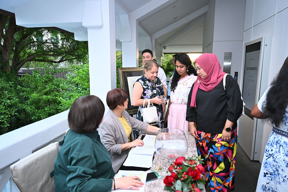 Emcee Singapore - Attendees registering at the reception before entering Revelry Hall.