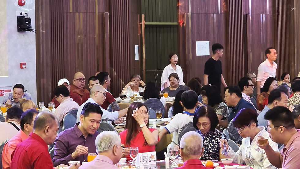 Emcee Singapore - A lively dinner filled with guests from Tampines North enjoying the meal together, highlighting a sense of community and celebration.