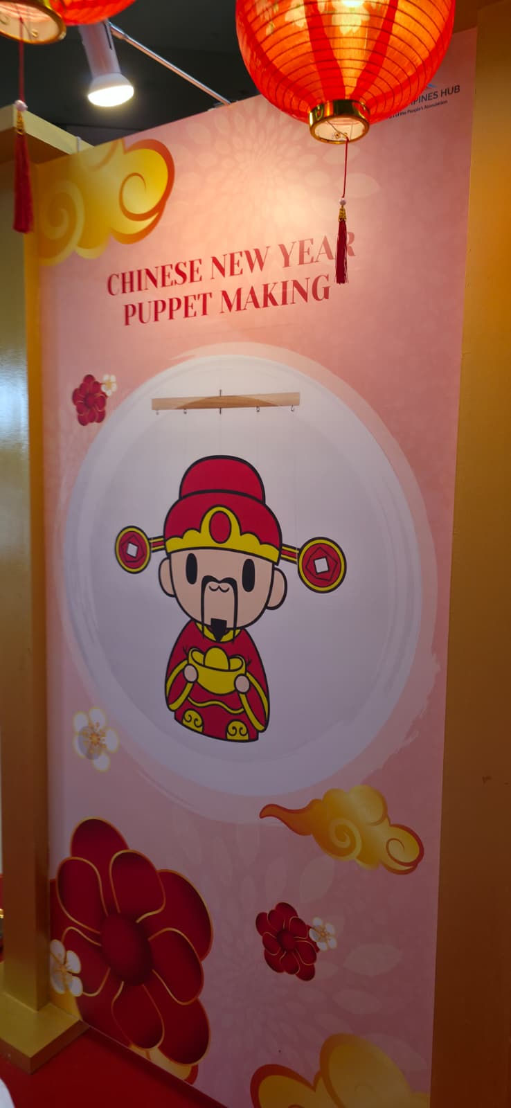 Emcee Singapore - The Chinese New Year Puppet Making booth attracted young children to participate and bring home their handicraft.