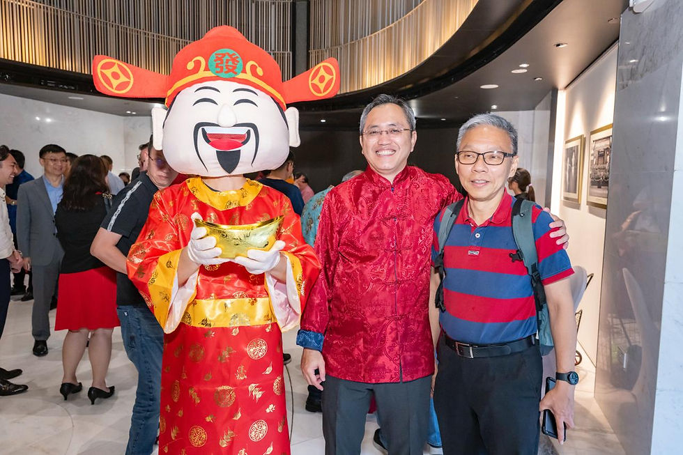 Emcee Singapore - Guests enjoyed a festive celebration with the God of Wealth mascot symbolizing prosperity and good fortune.