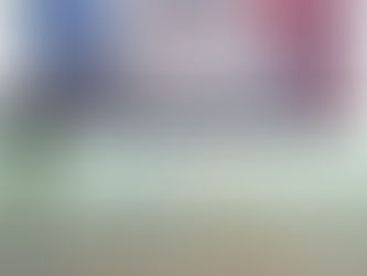 Emcee Singapore - Stage set for the Revenue Games at Singapore, featuring bold blue and red mascots ready for the exciting event happening on 25th January 206.