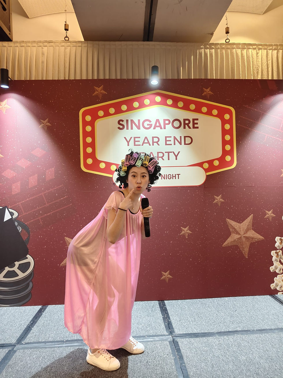 Emcee - Our lively host dressed in a character outfit entertaining the guests at the Pacific Life Re Singapore Year End Party, bringing humor and joy to the celebration.
