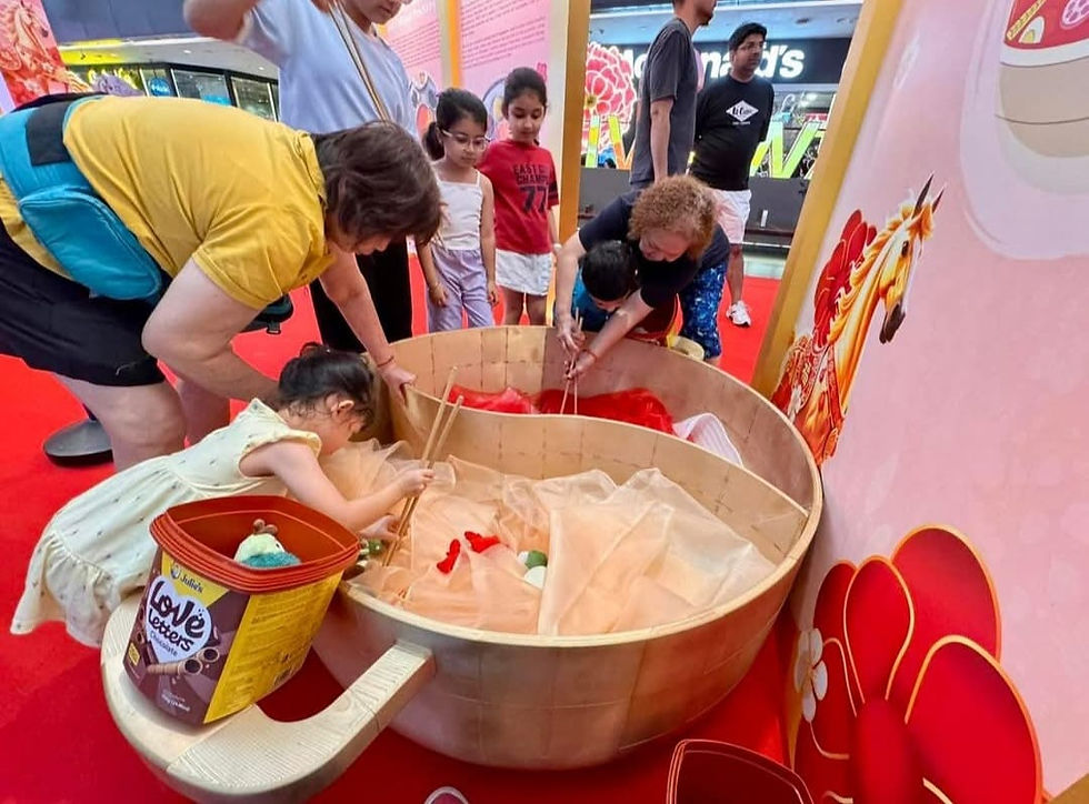 Emcee Singapore - Families bonded at the game booths set up at Our Tampines Hub in celebration of Chinese New Year.