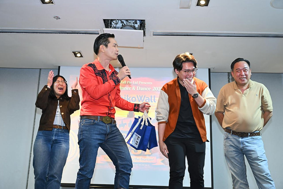 Emcee Singapore - Our emcee Ivan on stage to host games for staff of Seiko Wall to have fun and win prizes.