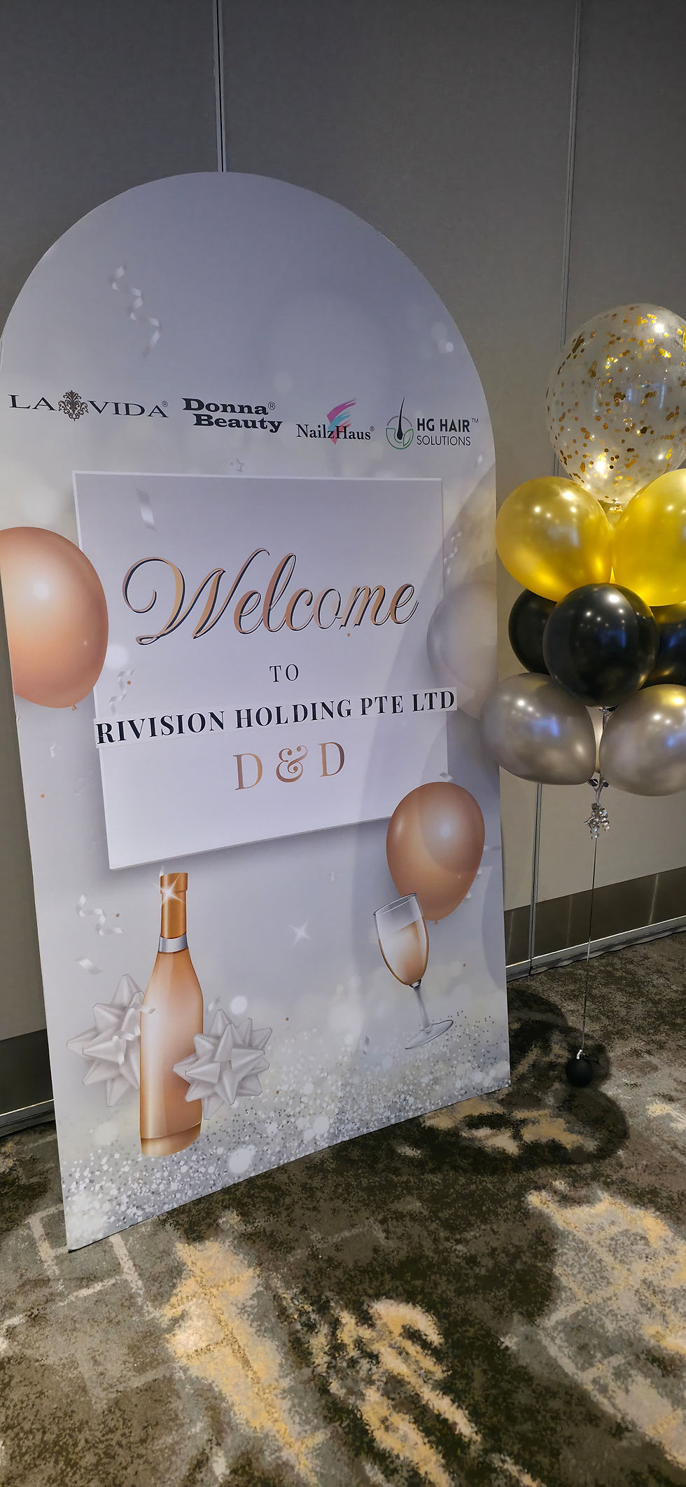 Emcee - Welcome to Rivision Holding PTE LTD's D&D event, celebrating partnerships with La Vida, Donna Beauty, Nailz Haus, and HG Hair Solutions.