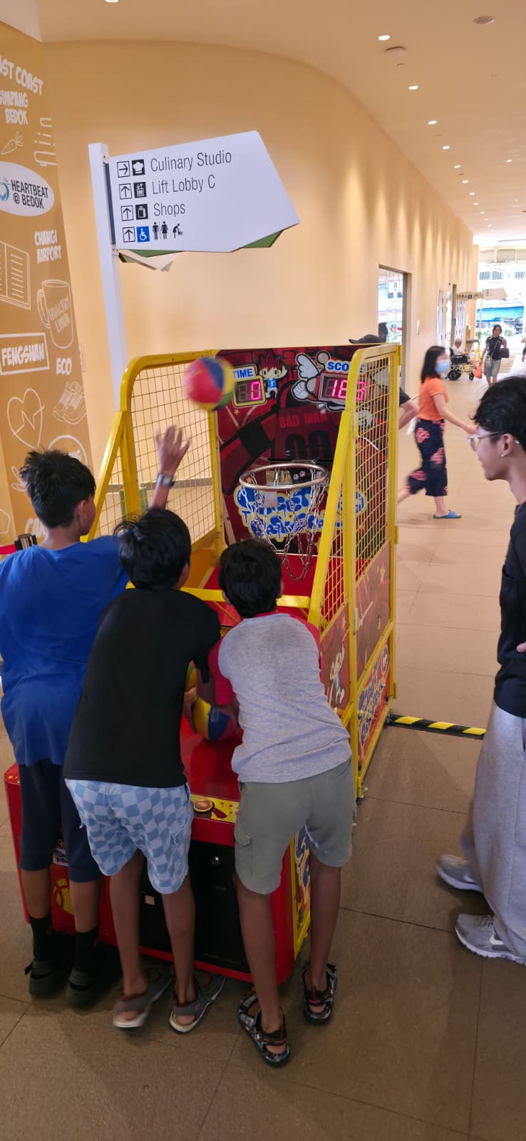 Emcee Singapore - Children jointly played basketball, perfecting their shots and enjoying the excitement of scoring high.