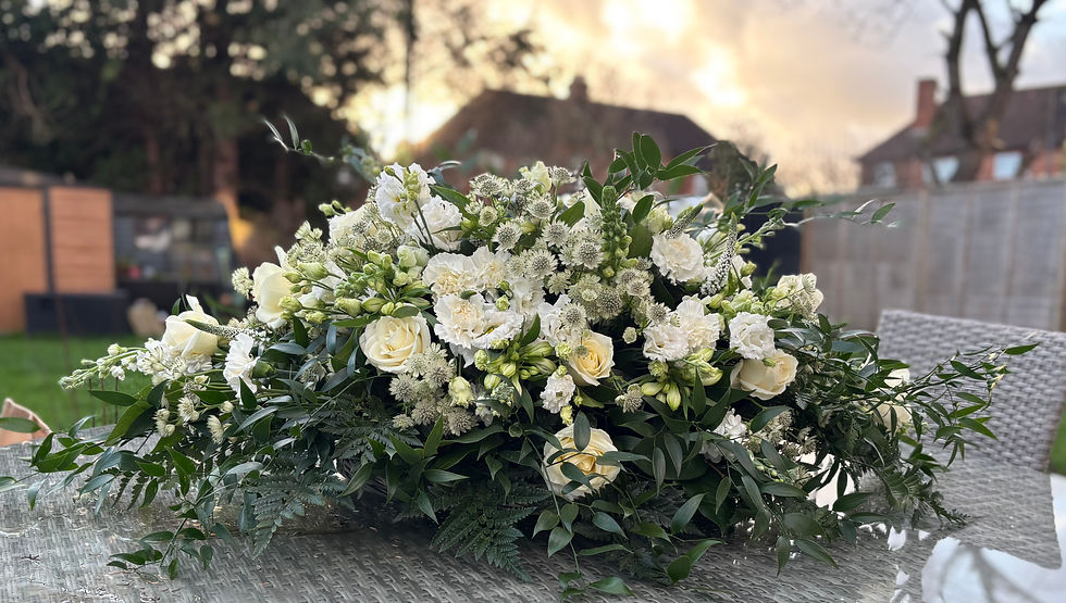 Beautiful casket spray created for a funeral in Alton, Hampshire