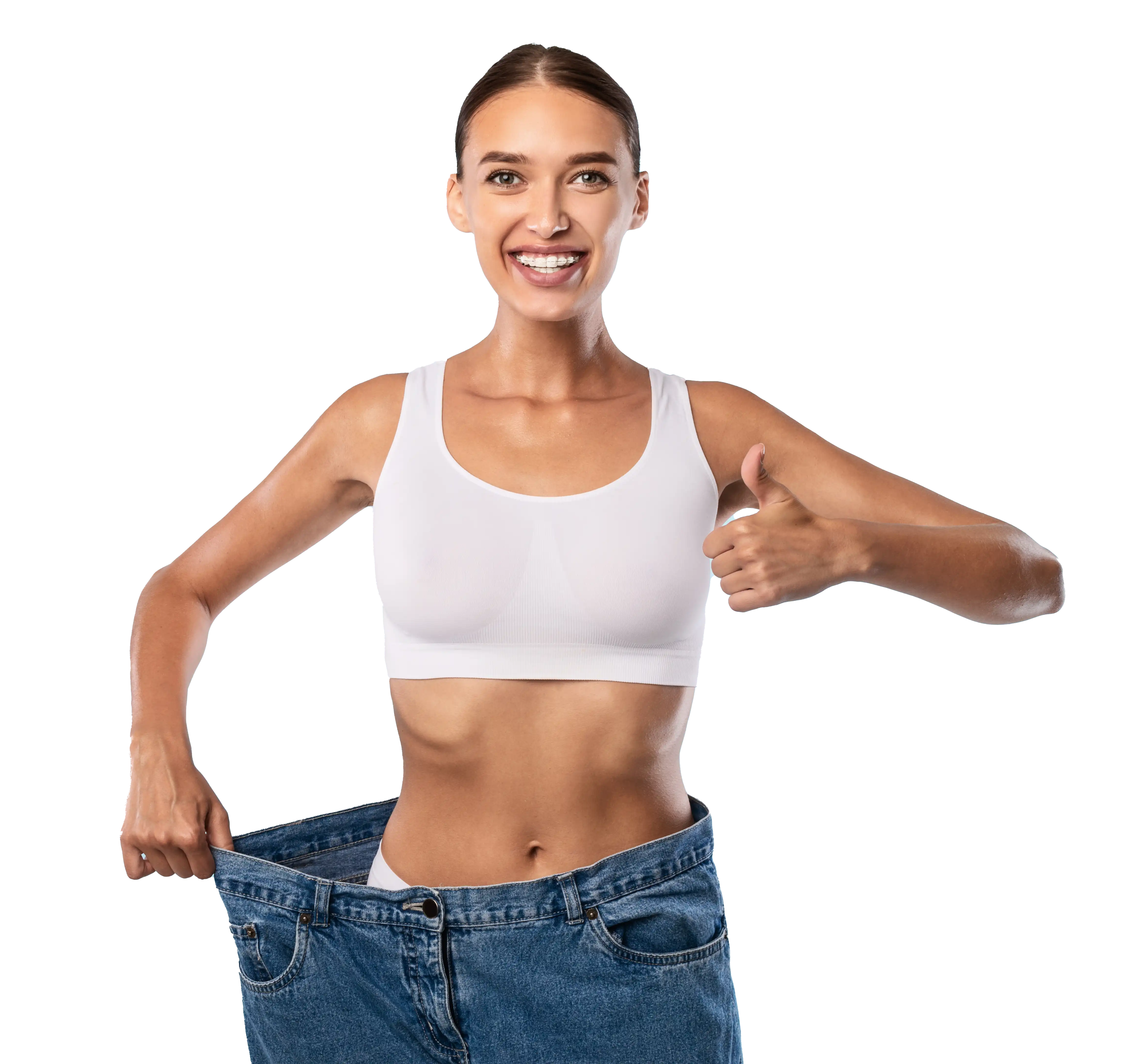 a woman pulling the side of her large old jeans to show how much she lost weight