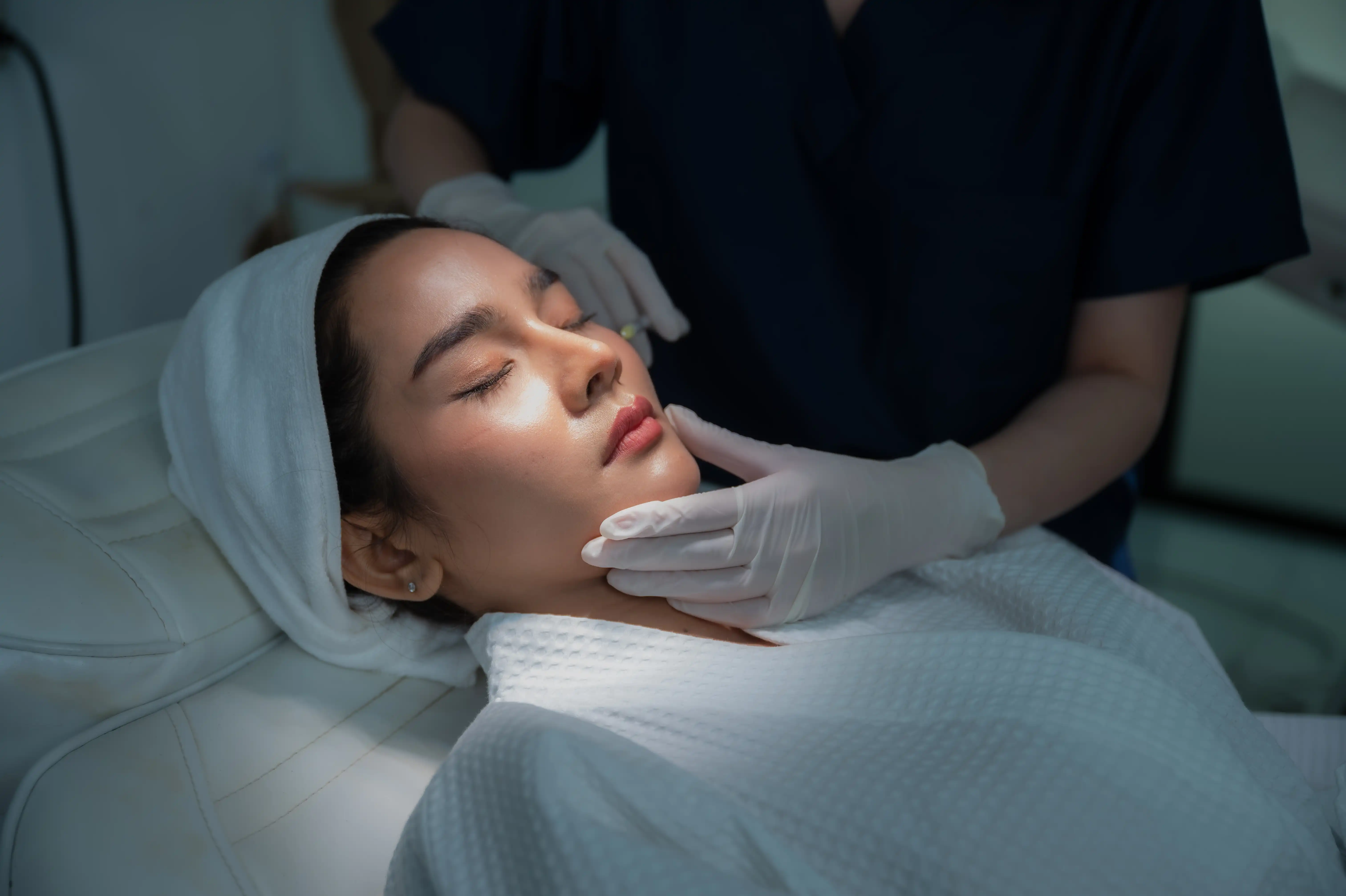 young-asian-woman-making-cosmetology-treatment-ski-2022-10-06-03-34-03-utc.webp