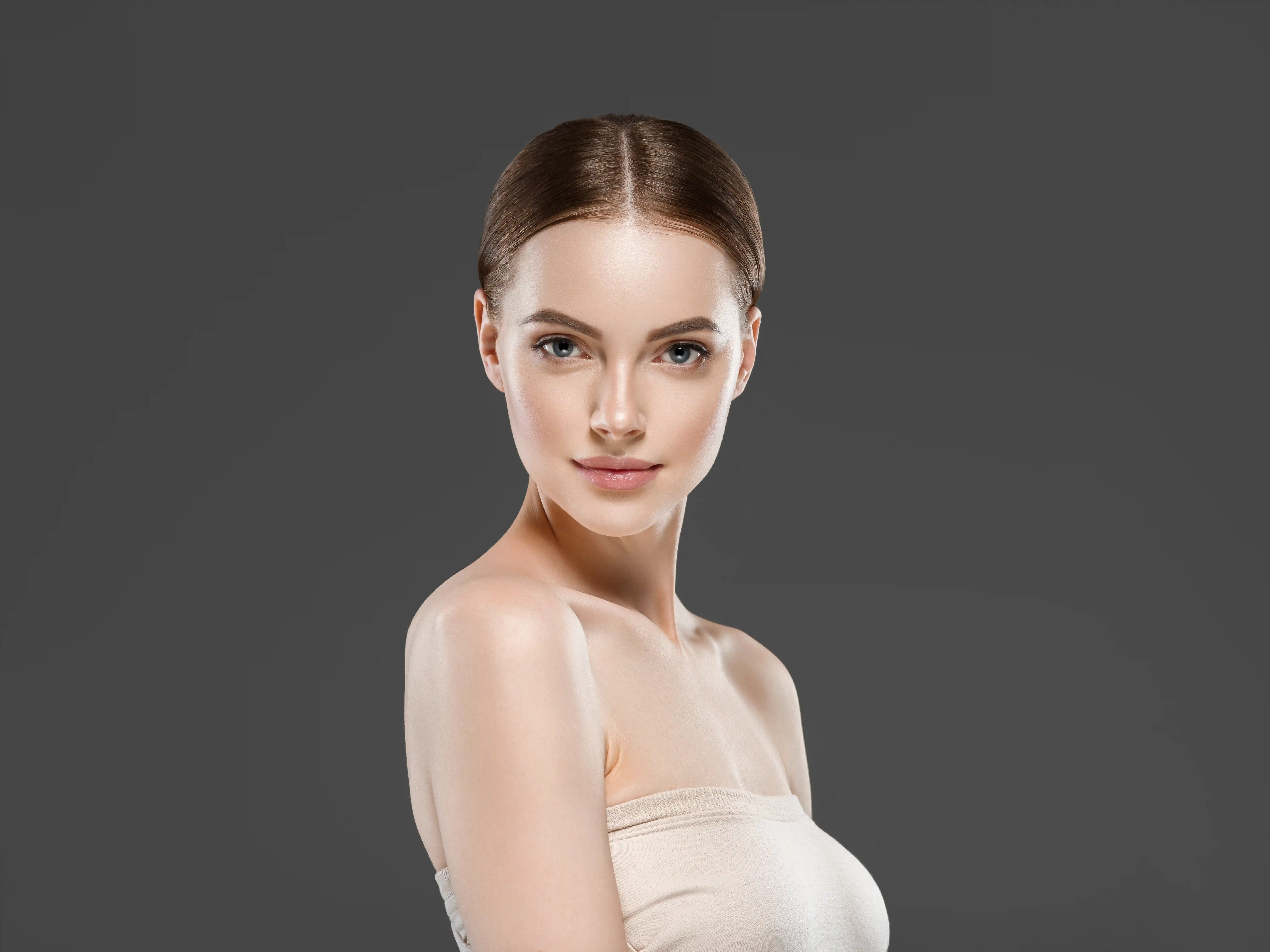 beautiful-face-woman-healthy-skin-gray-background-2021-08-28-10-13-55-utc.webp