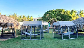 screened hammock tents set up in the outdoor medicine space at Doranja House