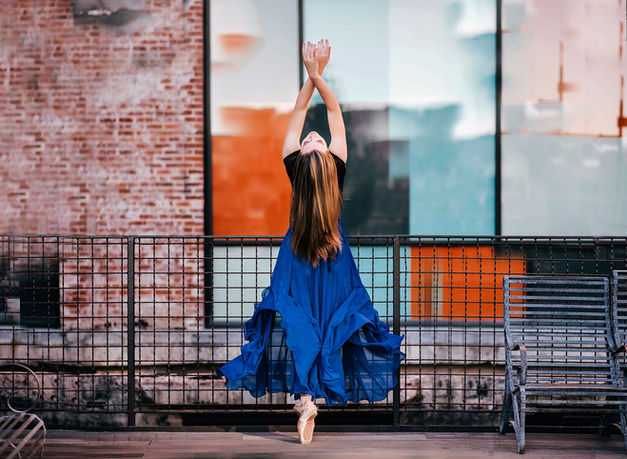 Dancer in blue skirt