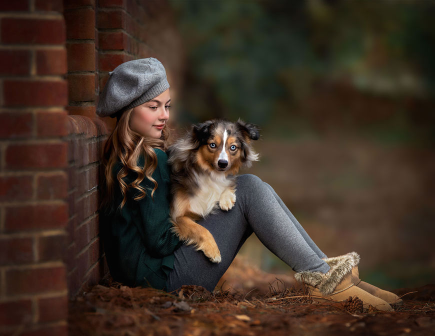 A young girl and her dog in a fine art portrait, capturing their deep bond in a timeless and elegant setting - captured by Marietta, GA photographer