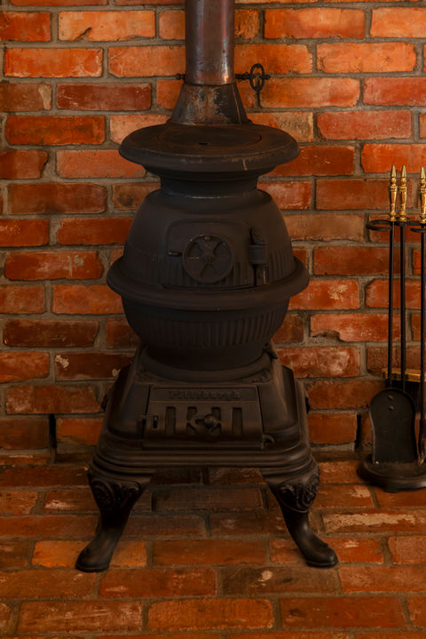 Pot belly stove at St Leonards Vineyard Cottages boutique accommodation in Blenheim, New Zealand