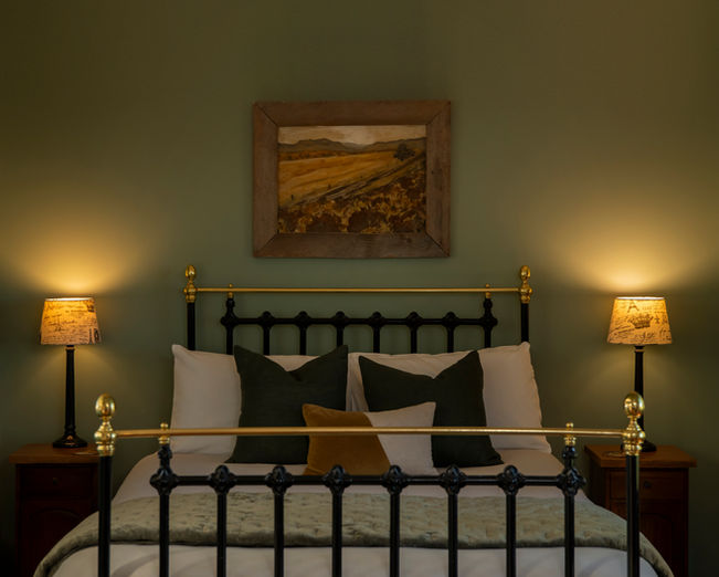 Queen bed at St Leonards Vineyard Cottages in Marlborough, New Zealand