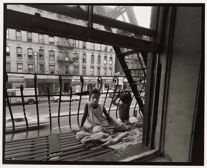 Historic NYC photos show residents using fire escapes like balconies. Learn why modern fire escapes must stay clear, functional, and inspection-ready.