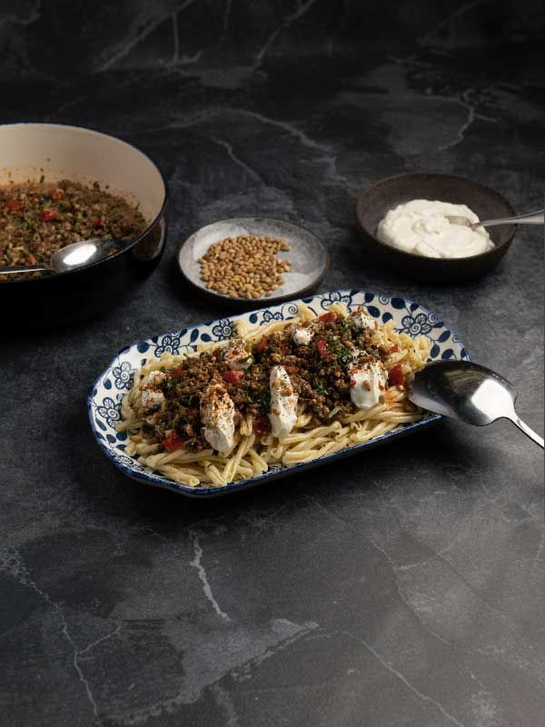 Thumbnail: Casarecce pasta with tomato sauce, anchovies, and olives