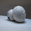 Thumbnail: Italian handmade ceramic from Etra Masi’s Skin series, twin spherical porcelain forms with textured surface.