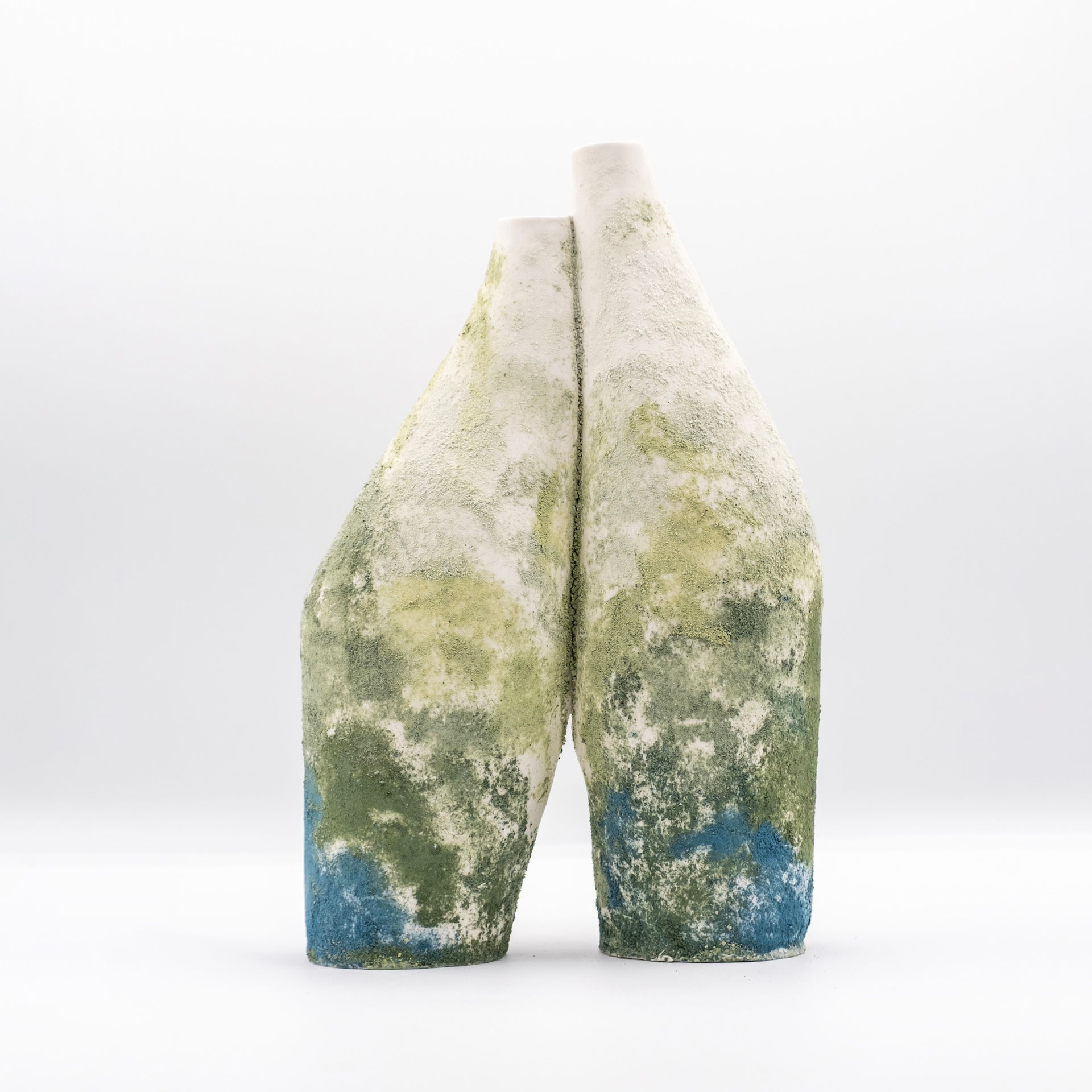 Handcrafted coloured porcelain vases