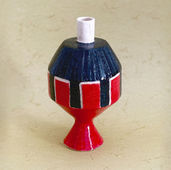 Handmade ceramic vase Il Faro from the Inutili Vasi series by Italian ceramic artist Anna Resmini, sculptural form with red and blue glaze