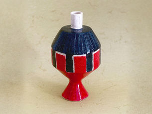Handmade ceramic vase Il Faro from the Inutili Vasi series by Italian ceramic artist Anna Resmini, sculptural form with red and blue glaze