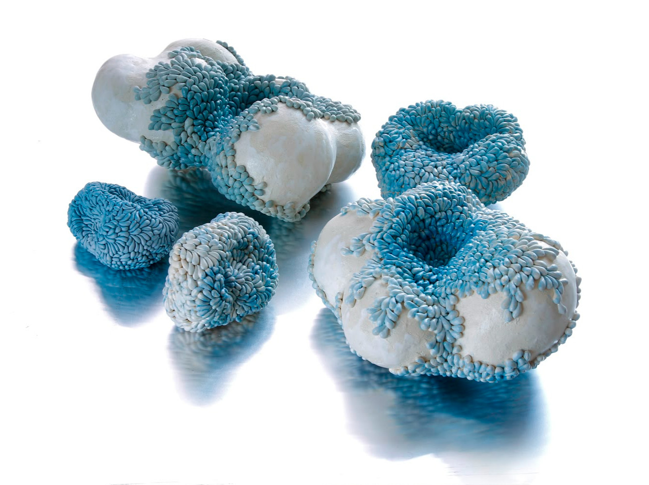 Pillows for Beautiful Thoughts, hand-built stoneware and porcelain sculpture by Italian ceramic artist Angelica Tulimiero, finished with stain, slip and glaze.
