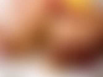 Cranberry orange olive oil cake with orange liqueur glaze on a white plate, festive Christmas dessert