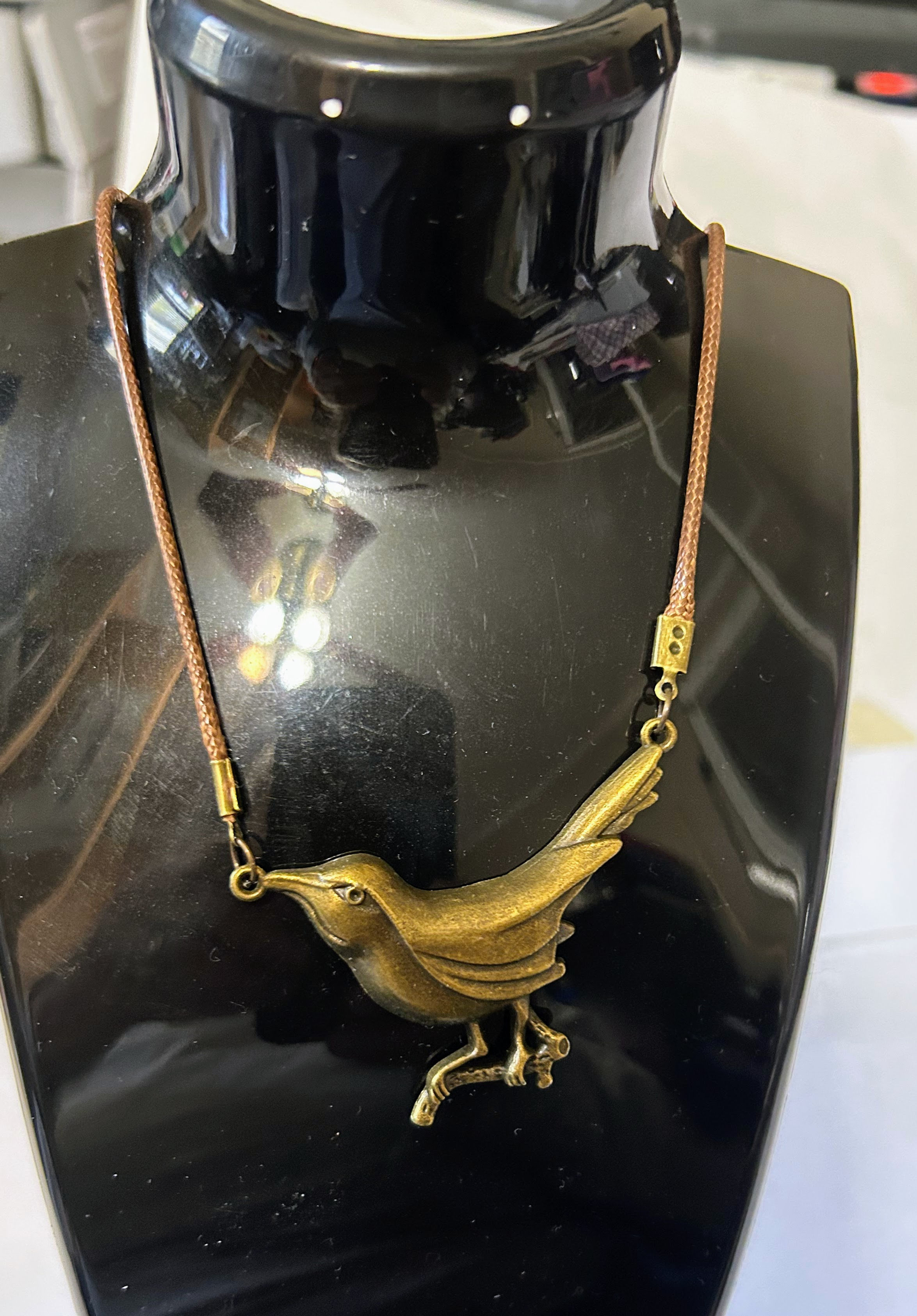 Bronze bird pendant necklace