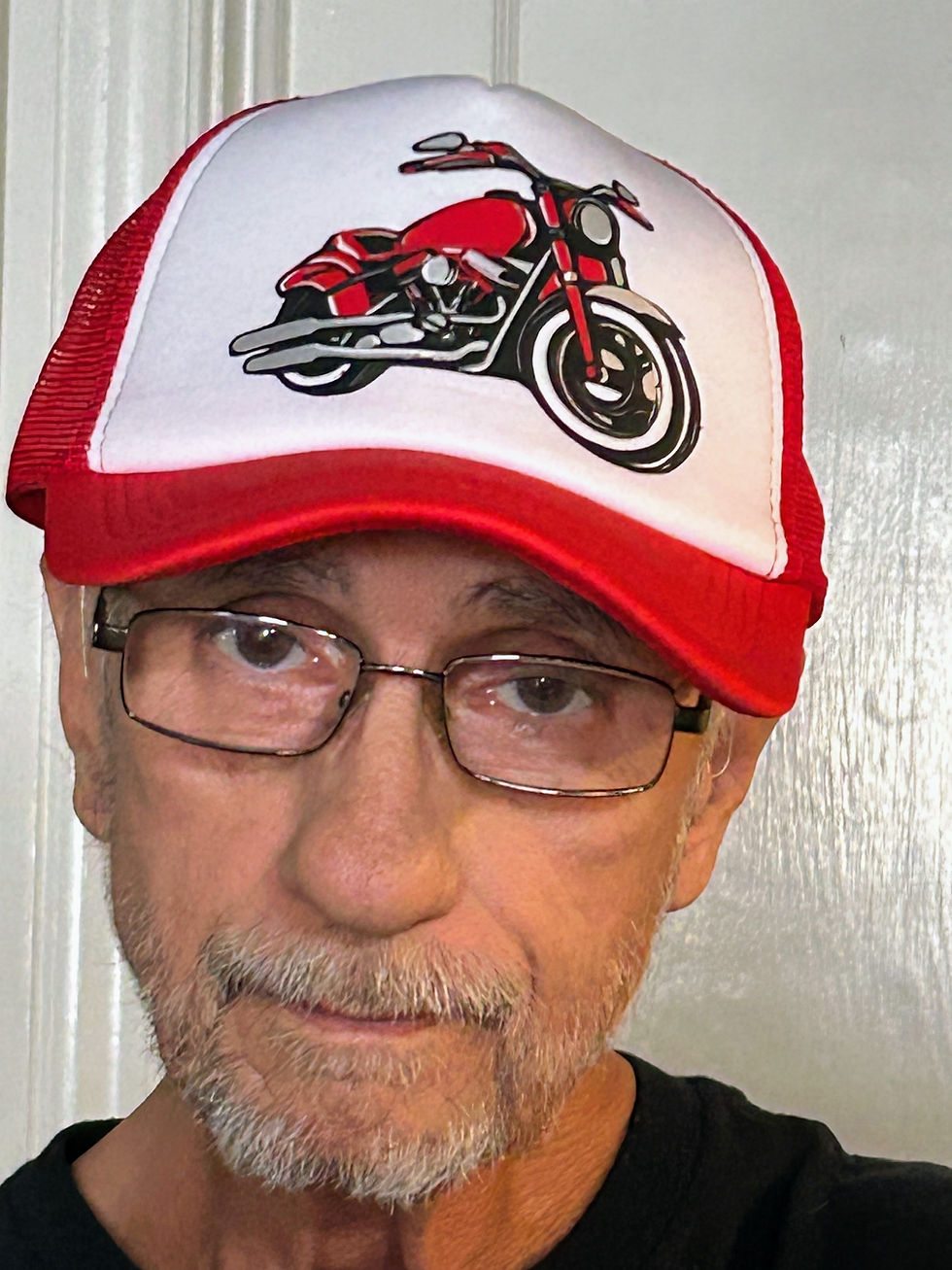 Red and white hat with red motorcycle