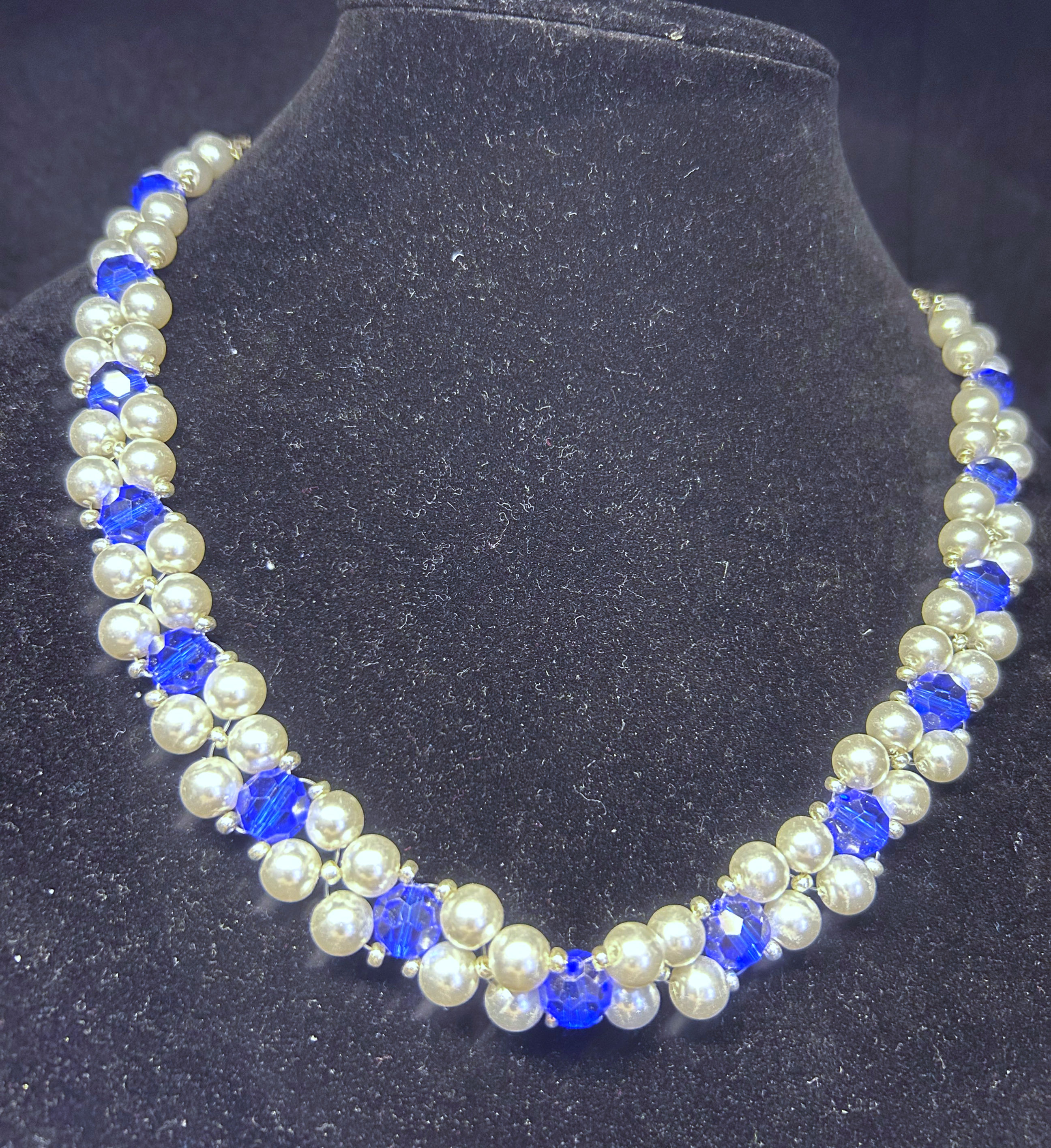 White and blue beaded necklace