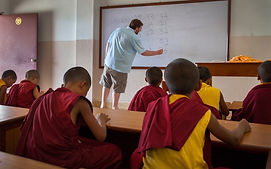 VIN volunteer teaching at Buddhist Monastery