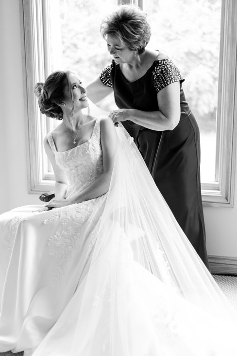 Mother and daughter wedding getting ready