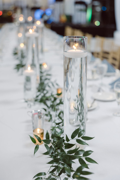 Glass cylinders with candles pastel wedding decor