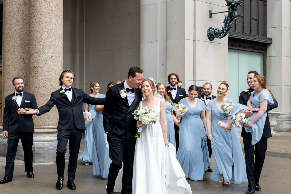 Elegant dove blue bridal party dresses and black suits