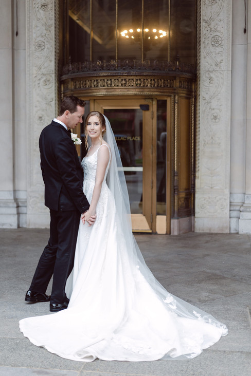Elegant bridal party portraits Cadillac Square polish wedding