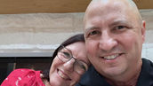 Craig Zuber smiling in a close selfie with his mom.