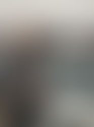 A happy person, standing outside Currie driving test centre after passing their driving test