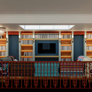 painted book shelves with brass uplights