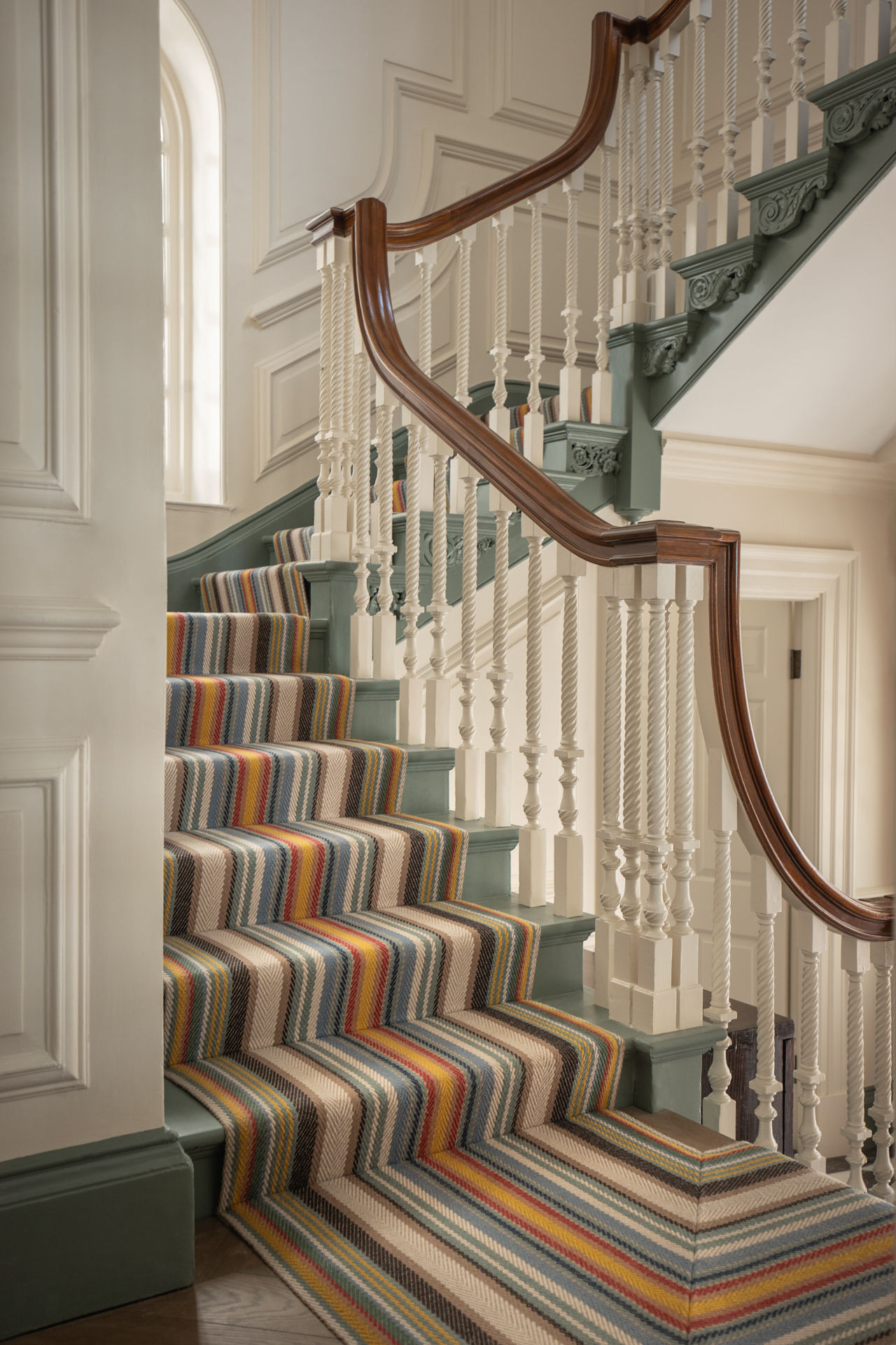 Traditional Belgravia staircase with runner 