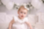 A photograph of a baby taken by a cake smash photographer in Coventry