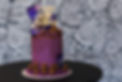 Dairy Milk Chocolate Cake decorated with purple buttercream