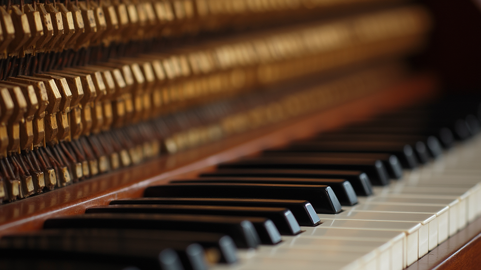 Close-up view of piano keys and strings inside a Conover Cable piano