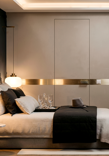 Hotel Amira deluxe oda yatak odası, açık renk ton ve lüks döşeme tasarımı - DPI Group