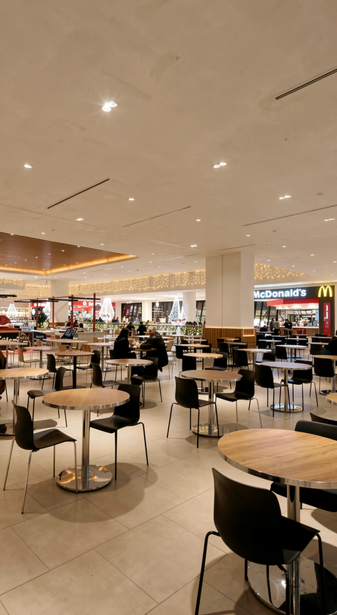 Liman AVM Bandırma alışveriş merkezi mimari ve iç mimari tasarımı 2011 Balıkesir Türkiye 60.000 m². Food court yemek alanı masa sandalye düzeni geniş mekan aydınlatma sistemi sosyal alan - DPI Group